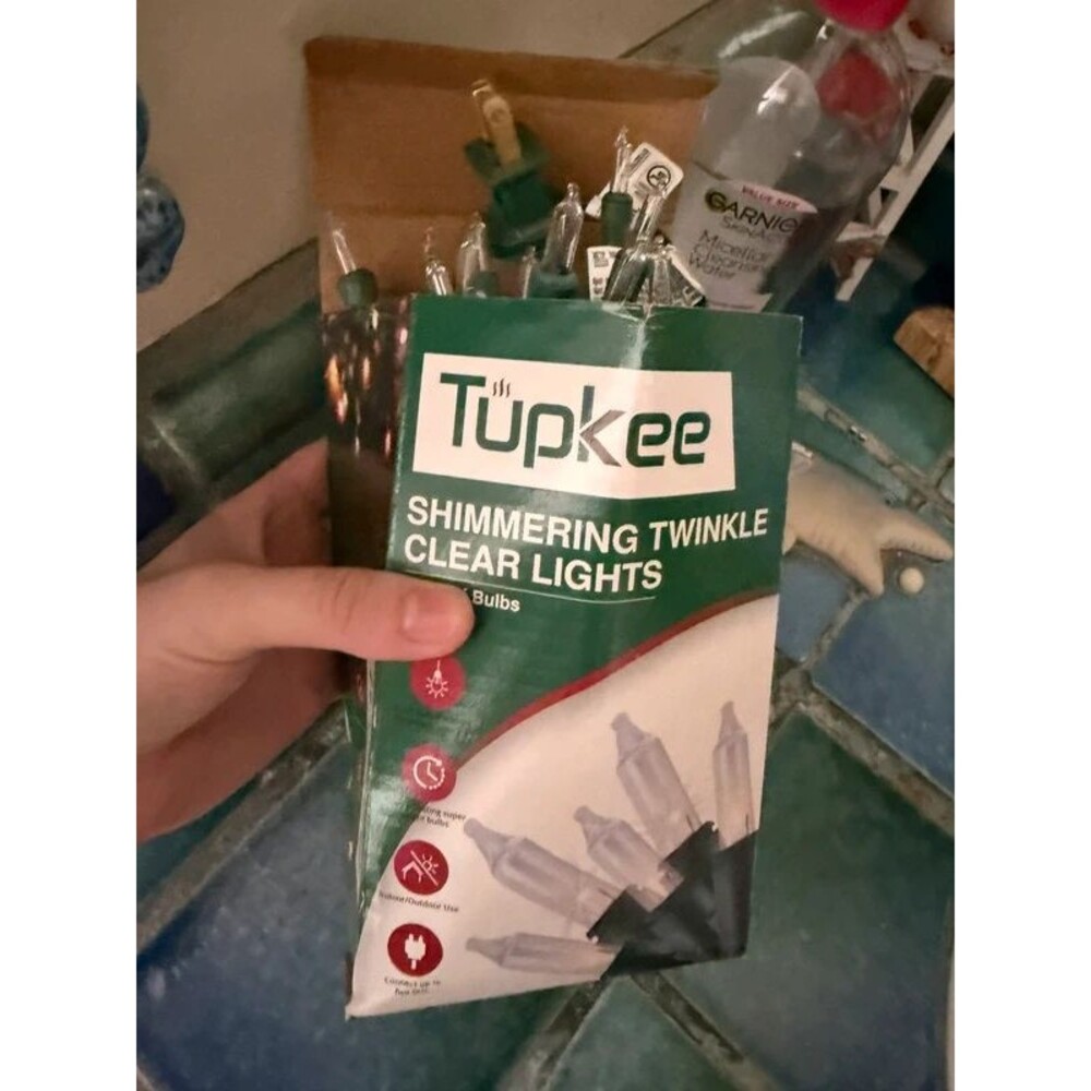 Box of twinkle lights shimmering clear lights green